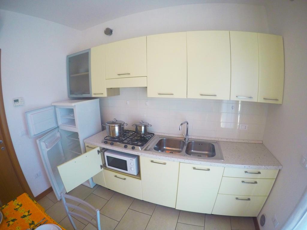 Residence Le Piramidi Каорле Экстерьер фото
