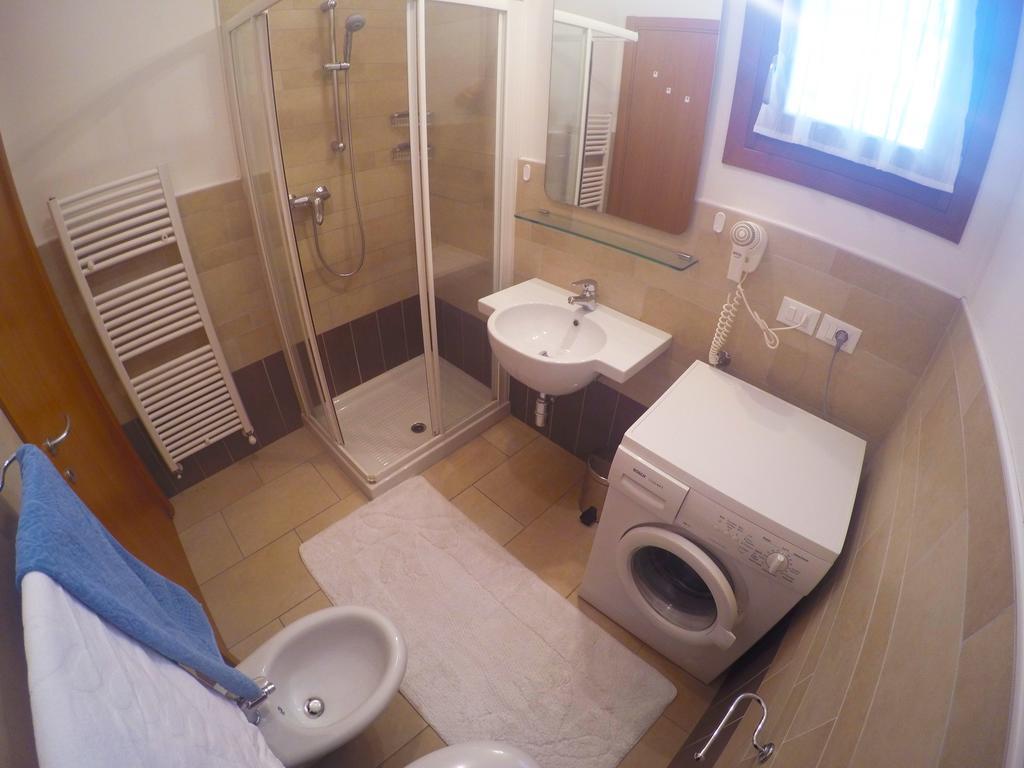 Residence Le Piramidi Каорле Экстерьер фото