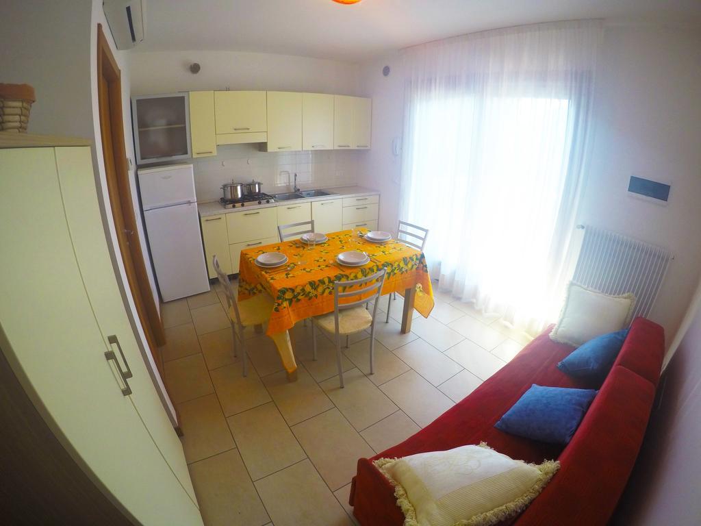 Residence Le Piramidi Каорле Экстерьер фото