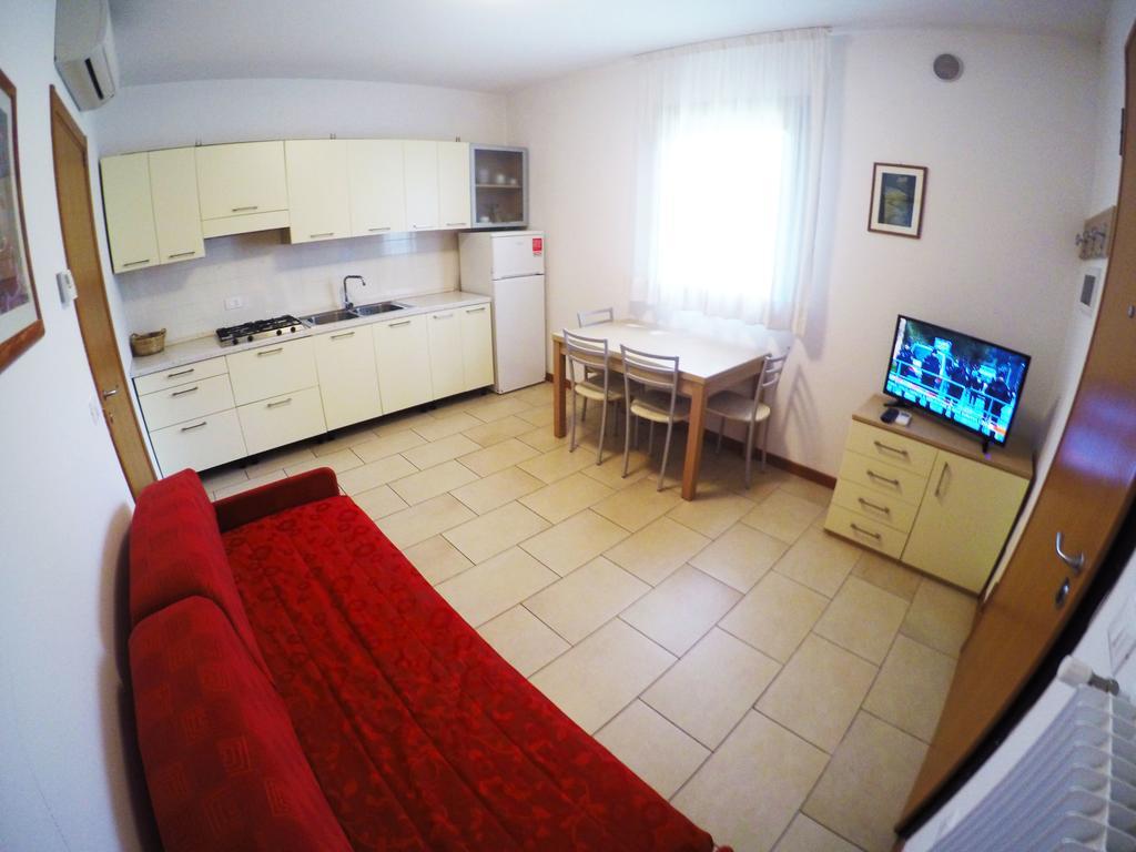 Residence Le Piramidi Каорле Экстерьер фото